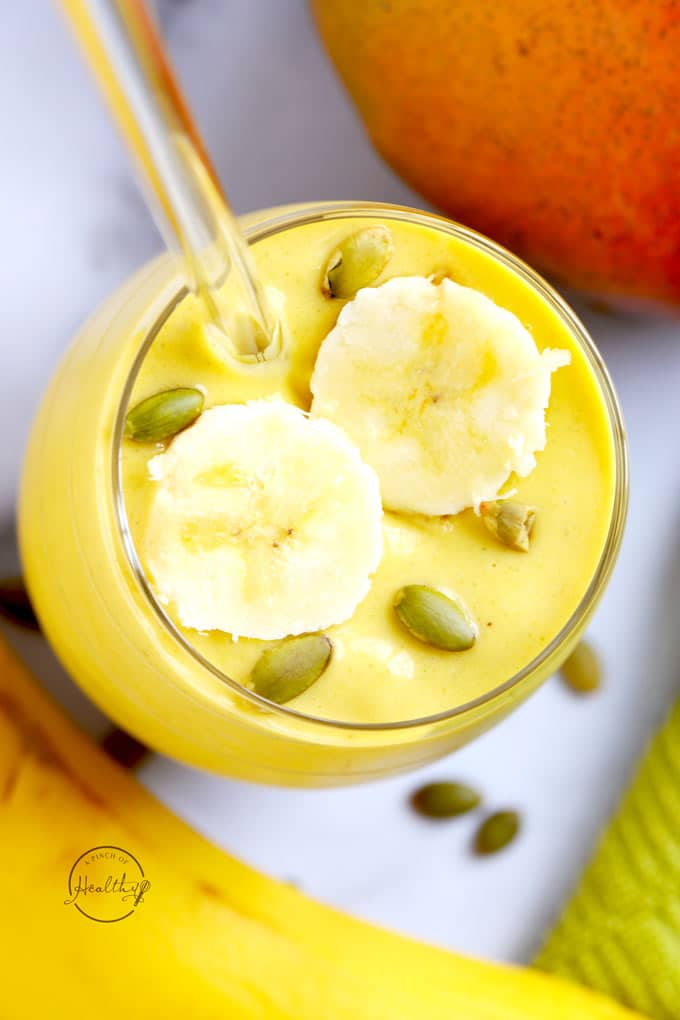 https://cdn-abioh.nitrocdn.com/iRwsMXPEdaMSNBlSqLBkXmjSJwoqRrps/assets/images/optimized/rev-01bf621/www.apinchofhealthy.com/wp-content/uploads/2019/03/Mango-Smoothie-overhead-closeup.jpg